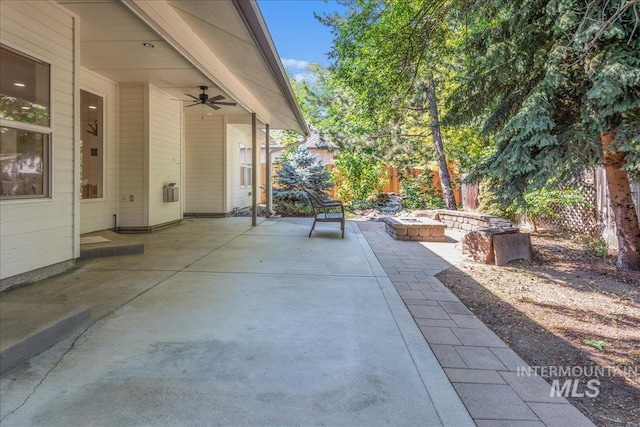 4975 N Morninggale Way, Boise, ID 83713 - view of patio / terrace featuring an outdoor fire pit and a ceiling fan