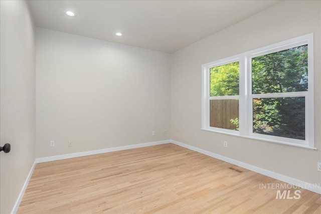4975 N Morninggale Way, Boise, ID 83713 - unfurnished room featuring light wood-style floors and recessed lighting