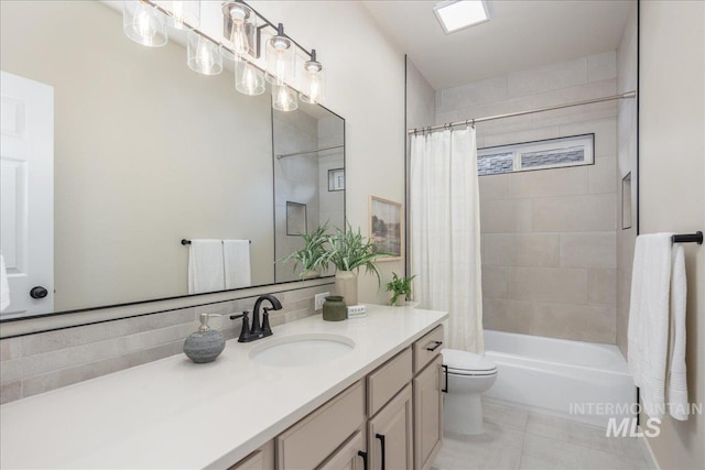 4975 N Morninggale Way, Boise, ID 83713 - full bathroom featuring vanity, shower / bath combo with shower curtain, and tile patterned floors
