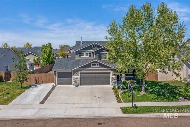 view of front facade featuring a garage, driveway, stone siding, and a residential view