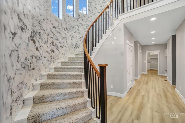 1580 Clear Creek Loop, Twin Falls, ID 83301 - stairway with wood finished floors, baseboards, and recessed lighting