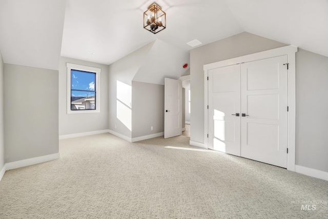 1580 Clear Creek Loop, Twin Falls, ID 83301 - additional living space featuring vaulted ceiling, light carpet, and baseboards
