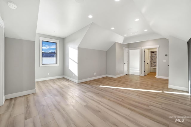 1580 Clear Creek Loop, Twin Falls, ID 83301 - bonus room featuring vaulted ceiling, baseboards, recessed lighting, and light wood-type flooring