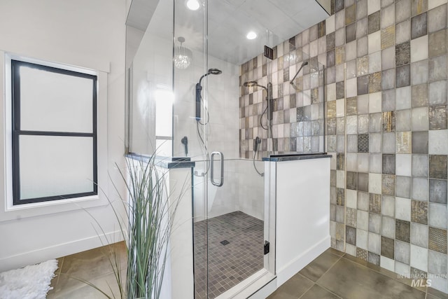 1580 Clear Creek Loop, Twin Falls, ID 83301 - bathroom featuring a stall shower, tile patterned flooring, tile walls, and recessed lighting
