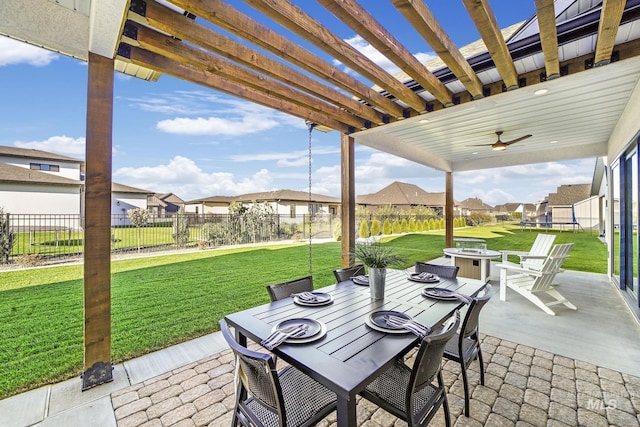 1580 Clear Creek Loop, Twin Falls, ID 83301 - view of patio featuring a residential view, outdoor dining area, ceiling fan, a fire pit, and a pergola