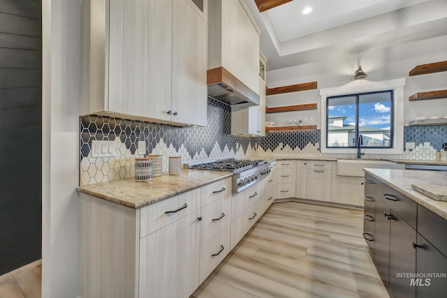 1580 Clear Creek Loop, Twin Falls, ID 83301 - kitchen featuring open shelves, a sink, stainless steel gas cooktop, light stone countertops, and custom range hood