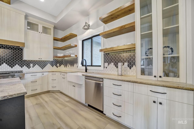 1580 Clear Creek Loop, Twin Falls, ID 83301 - kitchen with dishwasher, a sink, open shelves, light stone countertops, and decorative backsplash