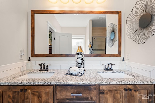 1175 N Champions Pl, Eagle, ID 83616 - bathroom with double vanity, a shower stall, and a sink