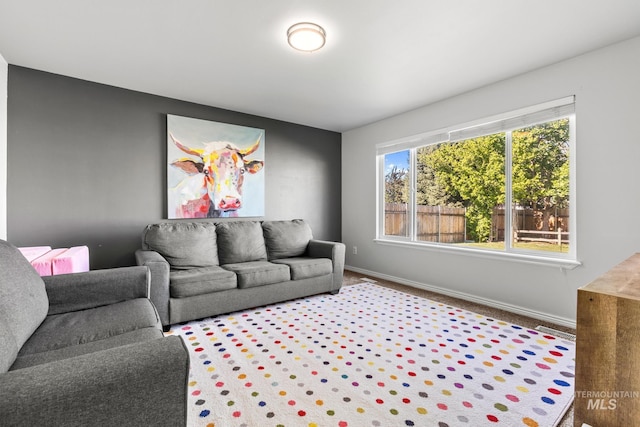 living room featuring baseboards