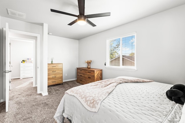 bedroom with carpet flooring, baseboards, and ceiling fan