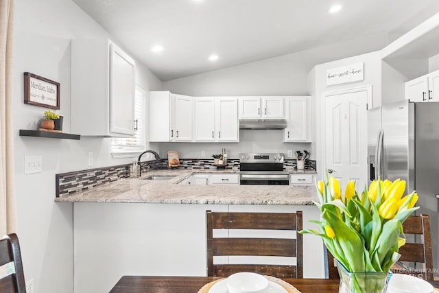 kitchen with appliances with stainless steel finishes, a sink, under cabinet range hood, light stone countertops, and white cabinets