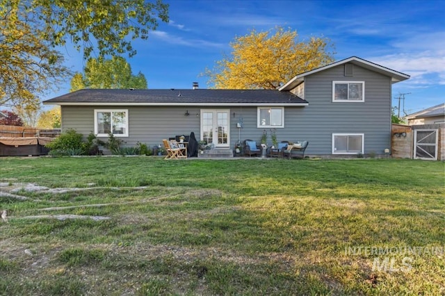 back of property featuring a patio