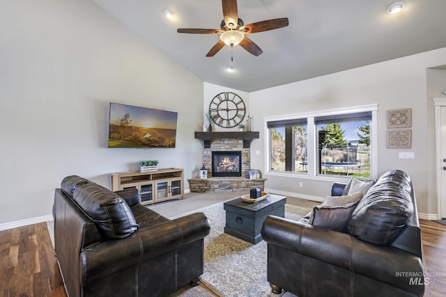 4049 Quail Ridge Dr, Kimberly, ID 83341 - living area with baseboards, vaulted ceiling, a ceiling fan, and wood finished floors