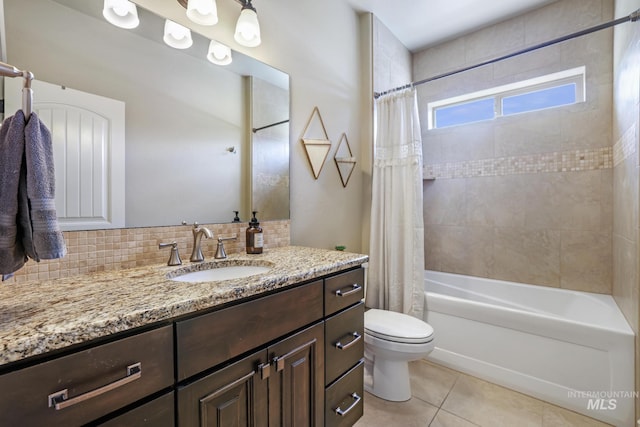 4049 Quail Ridge Dr, Kimberly, ID 83341 - bathroom with tasteful backsplash, toilet, shower / bath combo with shower curtain, vanity, and tile patterned floors