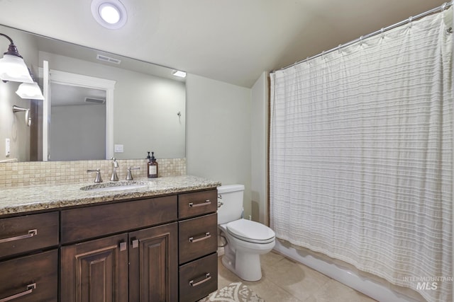 4049 Quail Ridge Dr, Kimberly, ID 83341 - bathroom featuring tasteful backsplash, visible vents, toilet, vanity, and tile patterned flooring