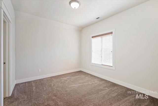 11871 W Wilmont St, Boise, ID 83709 - carpeted empty room with baseboards