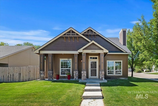 11871 W Wilmont St, Boise, ID 83709 - view of front facade with a chimney and stone siding
