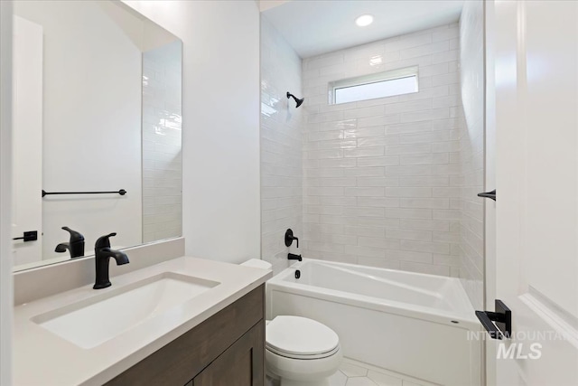 full bath with toilet,  shower combination, and vanity