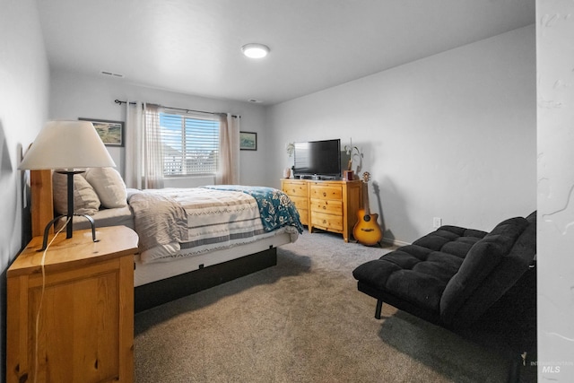 bedroom featuring visible vents and carpet floors