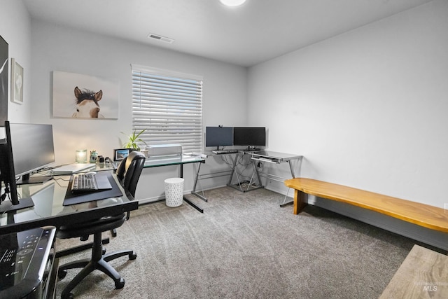 office space with carpet and visible vents