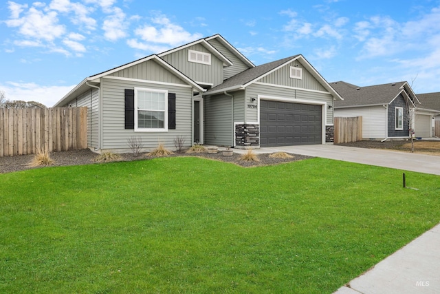 view of front of home featuring an attached garage, board and batten siding, driveway, and fence