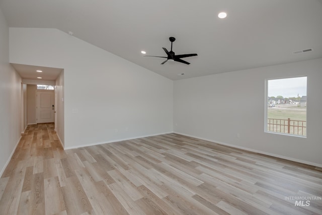 unfurnished room with light wood-style flooring, lofted ceiling, ceiling fan, and recessed lighting