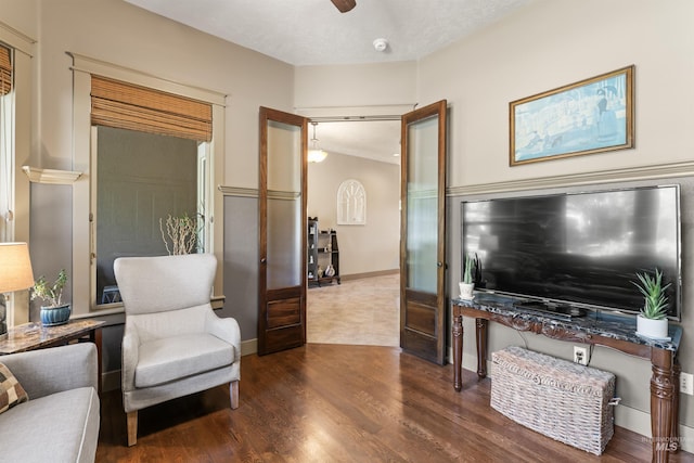 4763 S Skyridge Way, Boise, ID 83709 - living area with wood finished floors and a ceiling fan