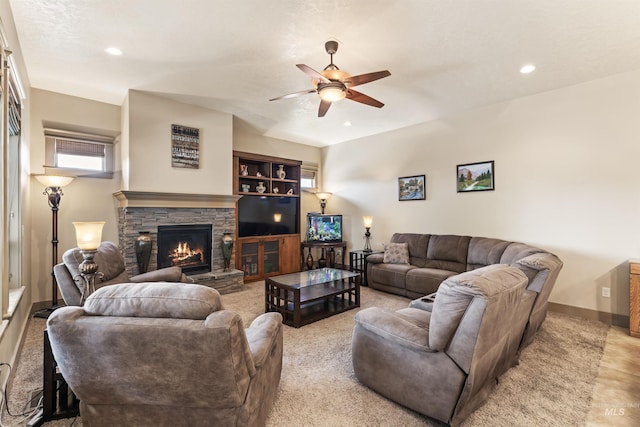 4763 S Skyridge Way, Boise, ID 83709 - living area with a ceiling fan, a stone fireplace, recessed lighting, and baseboards