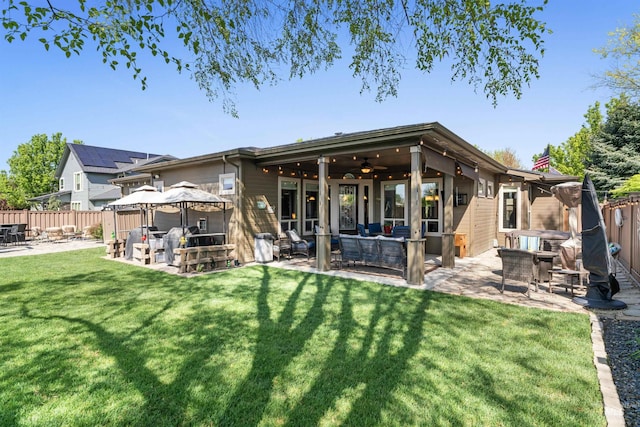 4763 S Skyridge Way, Boise, ID 83709 - rear view of property with a gazebo, a patio area, outdoor lounge area, a ceiling fan, and a hot tub