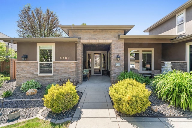 4763 S Skyridge Way, Boise, ID 83709 - view of exterior entry with stone siding and stucco siding