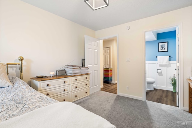 bedroom with carpet and ensuite bathroom