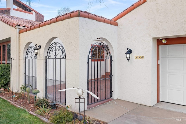 view of side of home with a garage