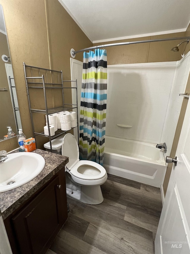 bathroom with toilet, vanity, shower / bath combo, and wood finished floors