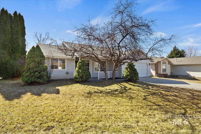 single story home featuring a porch, driveway, a front lawn, and a garage