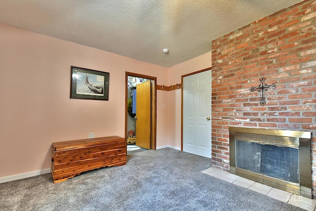 interior space with light carpet, a textured ceiling, and a fireplace