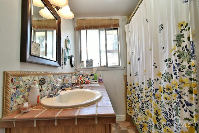 bathroom with vanity and a shower with curtain