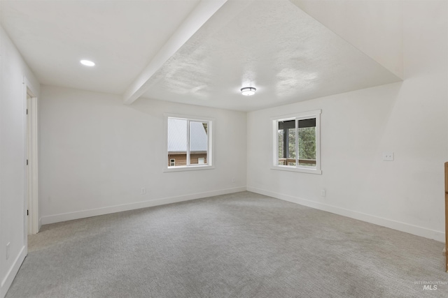unfurnished room with recessed lighting, carpet, and baseboards
