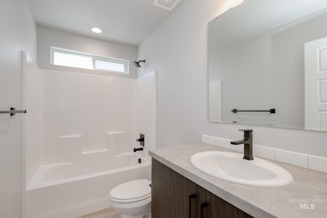 full bathroom featuring shower / bathtub combination, recessed lighting, visible vents, toilet, and vanity