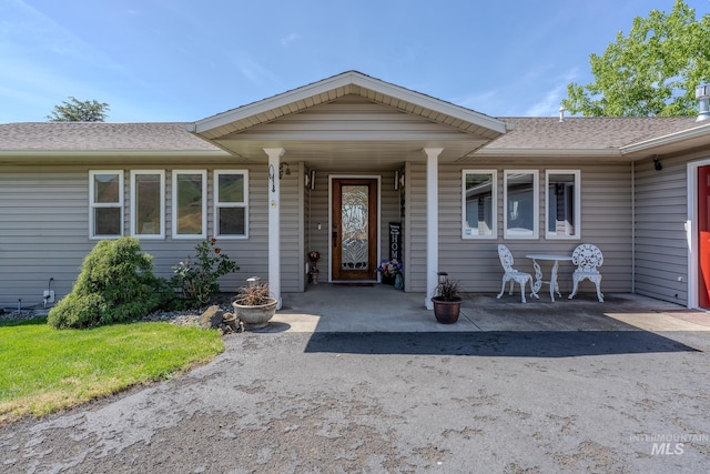 23400 Windy Ridge Ln, Lewiston, ID 83501 - view of exterior entry with a shingled roof