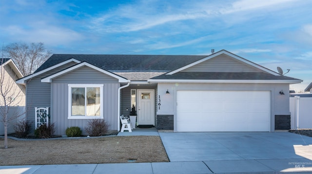 single story home with fence, a garage, driveway, and roof with shingles