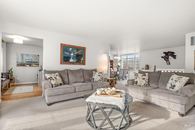 living room with light colored carpet