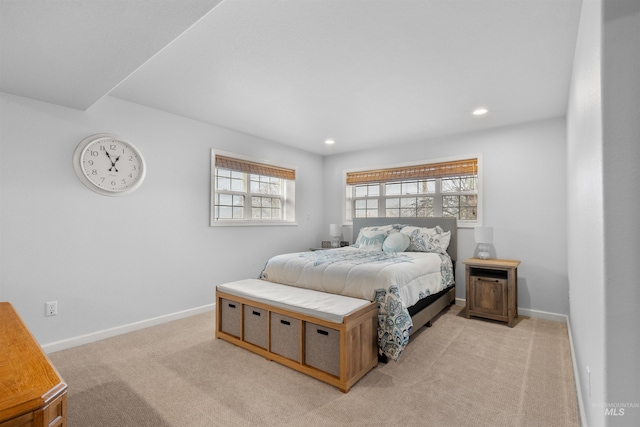 bedroom with light carpet