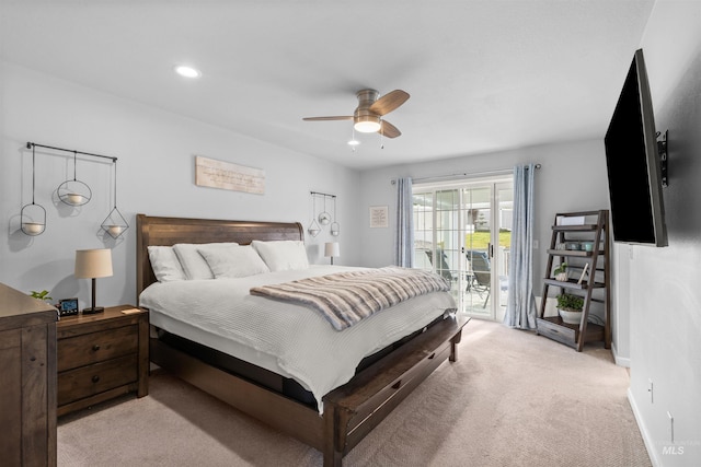 carpeted bedroom with ceiling fan and access to exterior