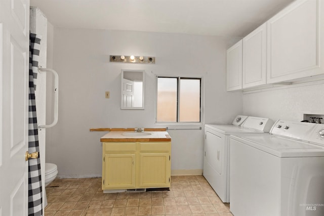 laundry room featuring washer and clothes dryer