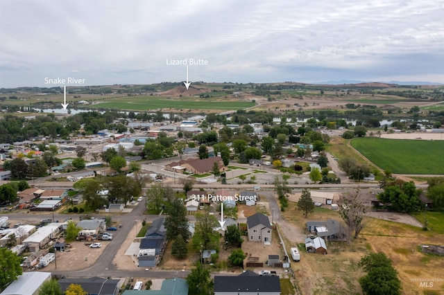 aerial view of property's location featuring nearby suburban area