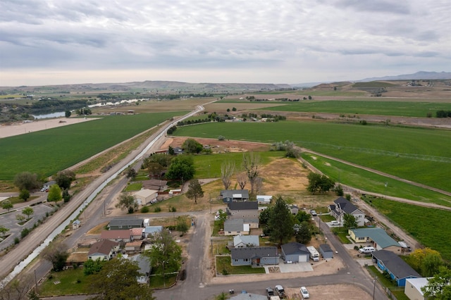 aerial view of property's location featuring rural landscape and mountains