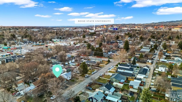 birds eye view of property with a residential view