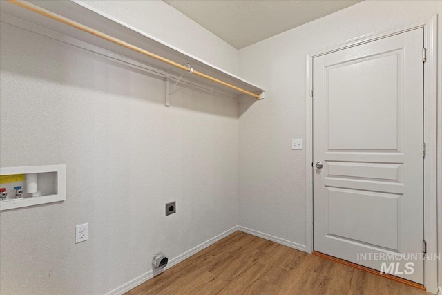 201 W Lava Fls, Meridian, ID 83646 - washroom with electric dryer hookup, light wood-style flooring, hookup for a washing machine, and baseboards