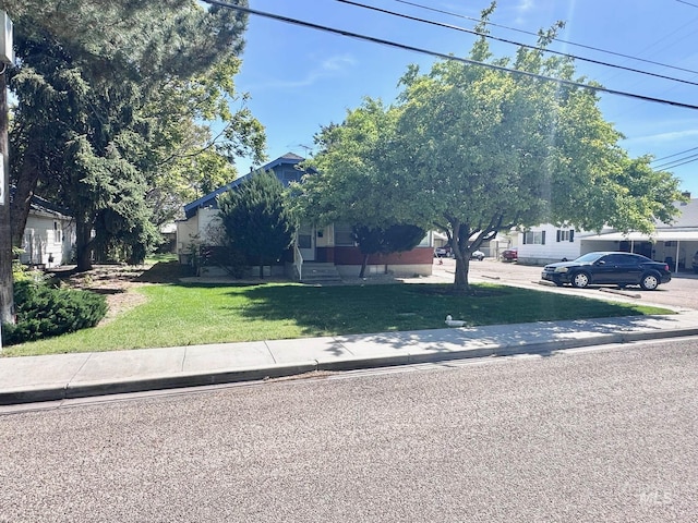 135 Davis Ave, Nampa, ID 83651 - obstructed view of property with a front yard