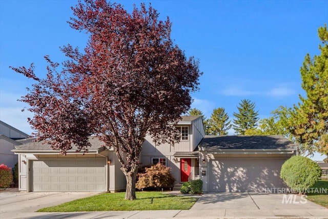 view of front of property featuring a garage